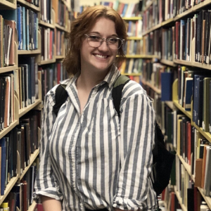 Ashlyn Yule standing in library