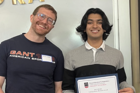Undergraduate Linguistics student Zahin Hoque (right) poses with Dr. Chacón (left).